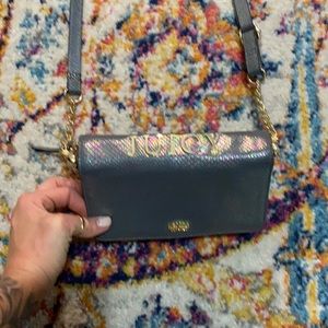 Brand new *Juicy* wallet with long strap.
